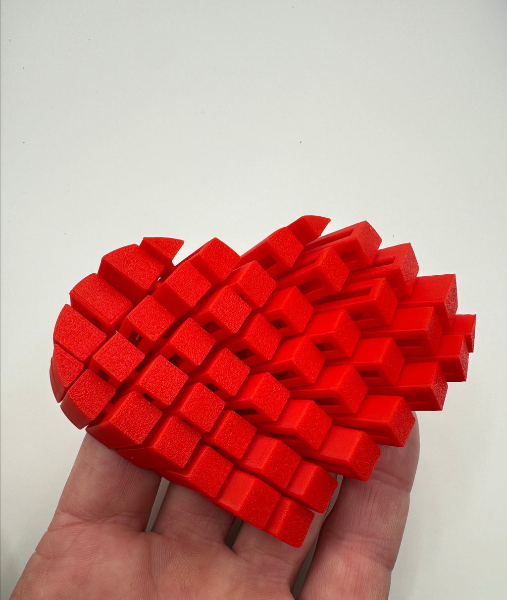 red fidget heart